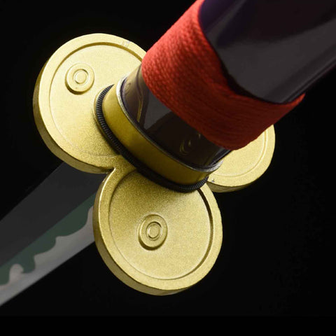 Close-up of the decorative alloy tsuba of the Enma Katana
