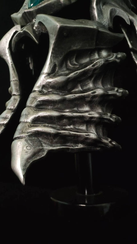 world of warcraft lich king helm displayed in dark scene collectible showcase