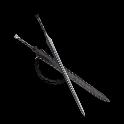 Clay tempered edge of hand forged medieval spear sword enhancing hardness and flexibility