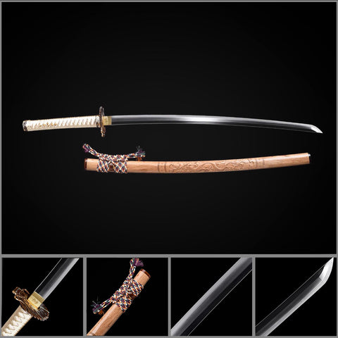 Full length view of hand forged T10 dragon scale katana with clay tempered blade and copper fittings
