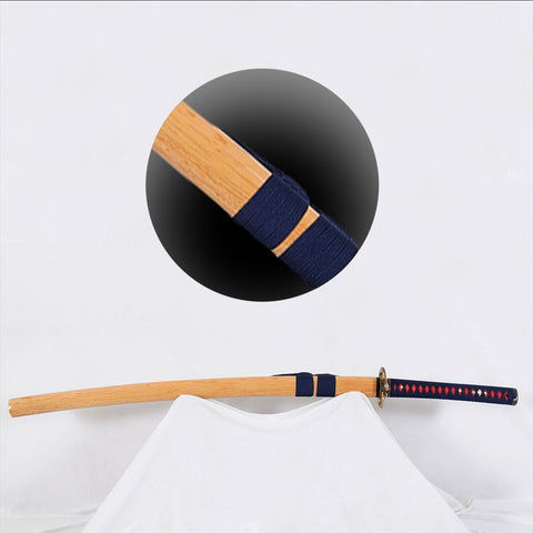 Traditional hardwood saya scabbard with visible wood grain and buffalo horn reinforcement