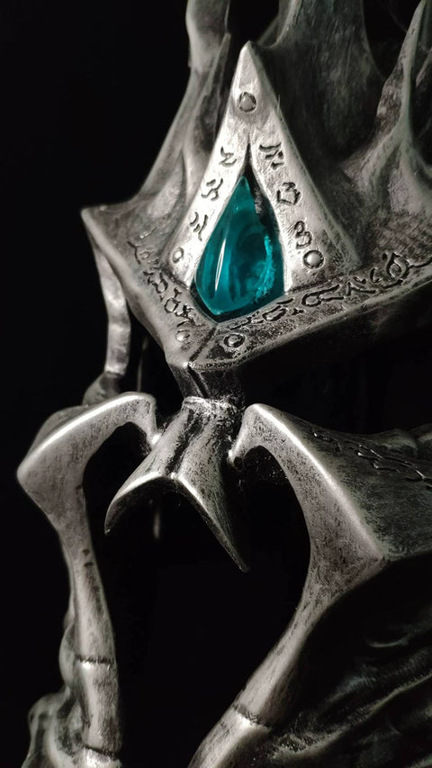 close up detail of helm of domination 2.0 showing weathered metal texture and craftsmanship