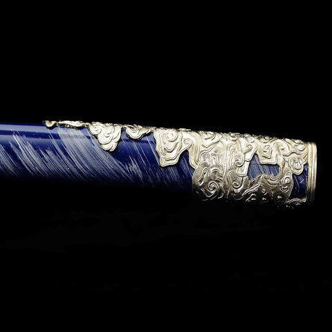 Close-up of the saya end cap (kojiri) with reinforced tip