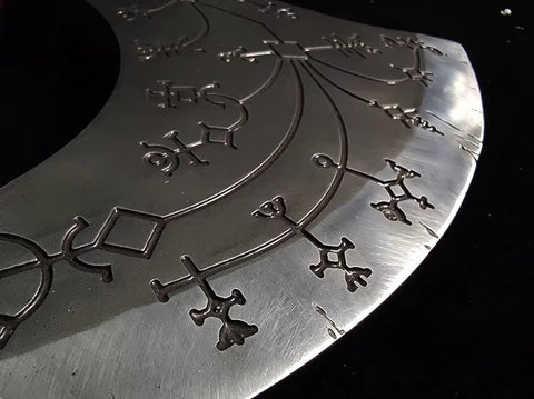 close-up of solid forged steel axe head with 56+ hardness finish