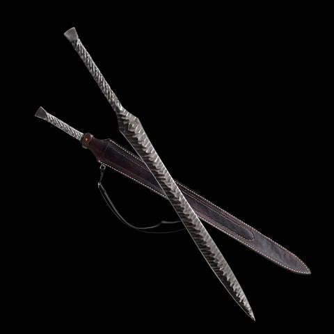 Hand forged European spear sword displayed with maroon leather scabbard for protection