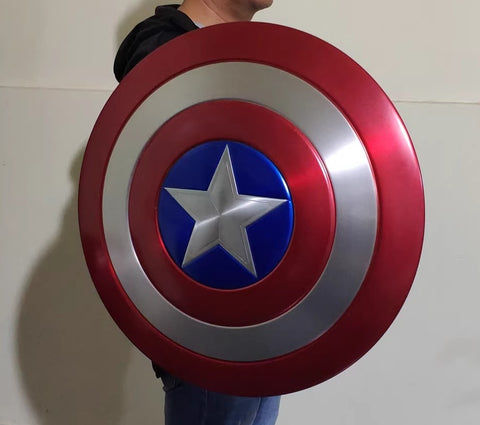 Action pose of cosplay with Captain America battle-damaged shield replica